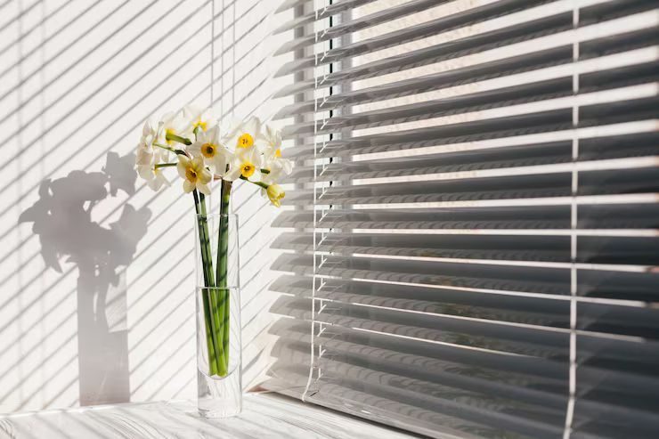 Which type of blinds lasts longer in humid areas
