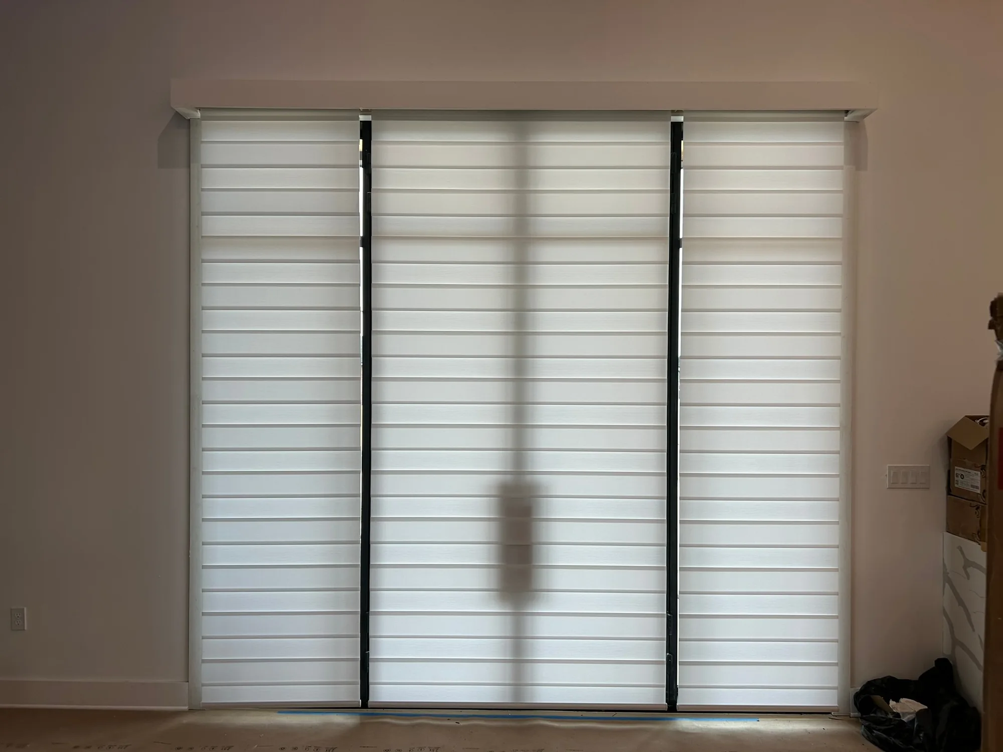 Drapery & Banded across a bright Texas window wall