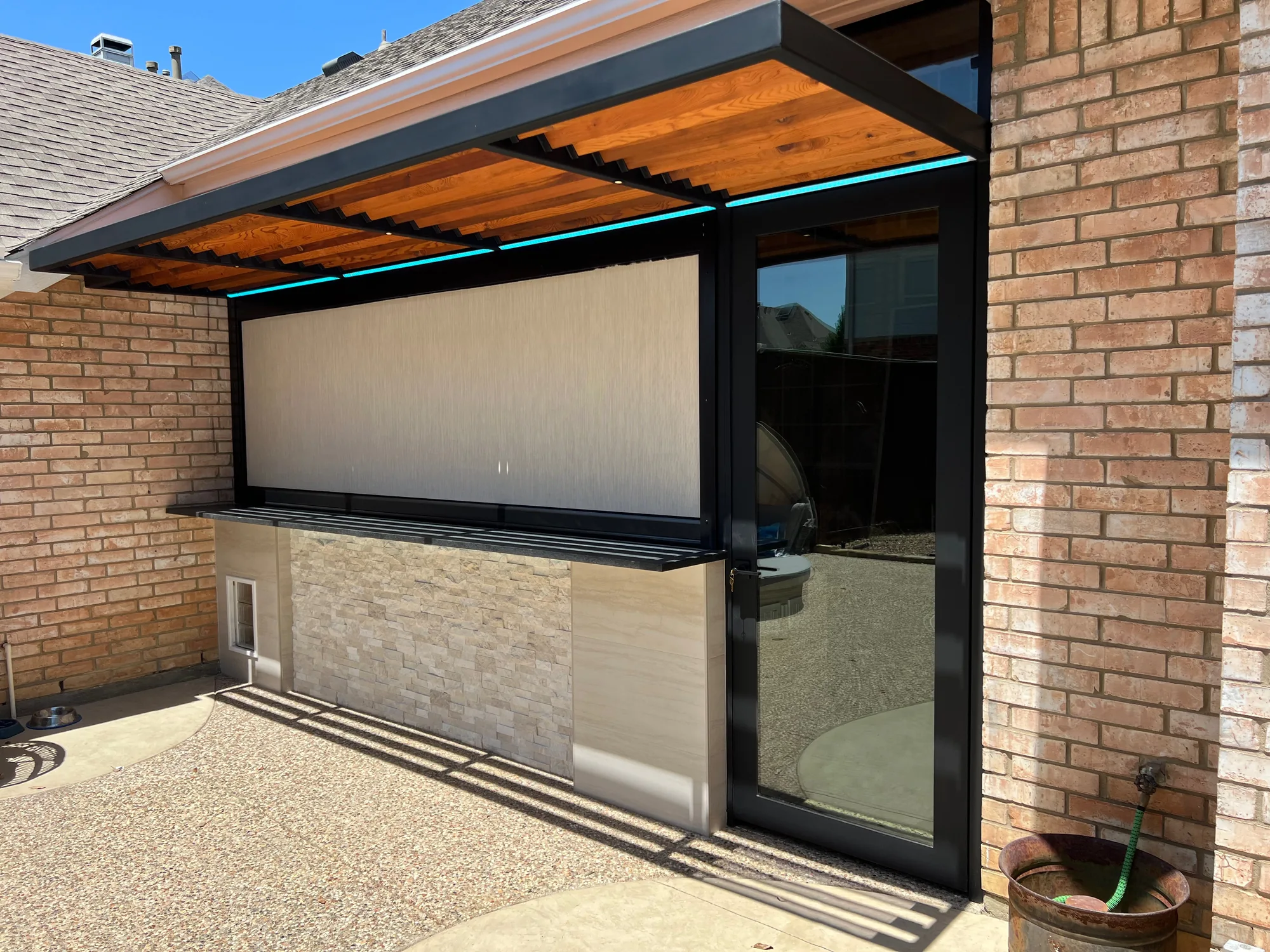 Exterior Patio Shades installed in a Euless, TX home by Love Is Blinds