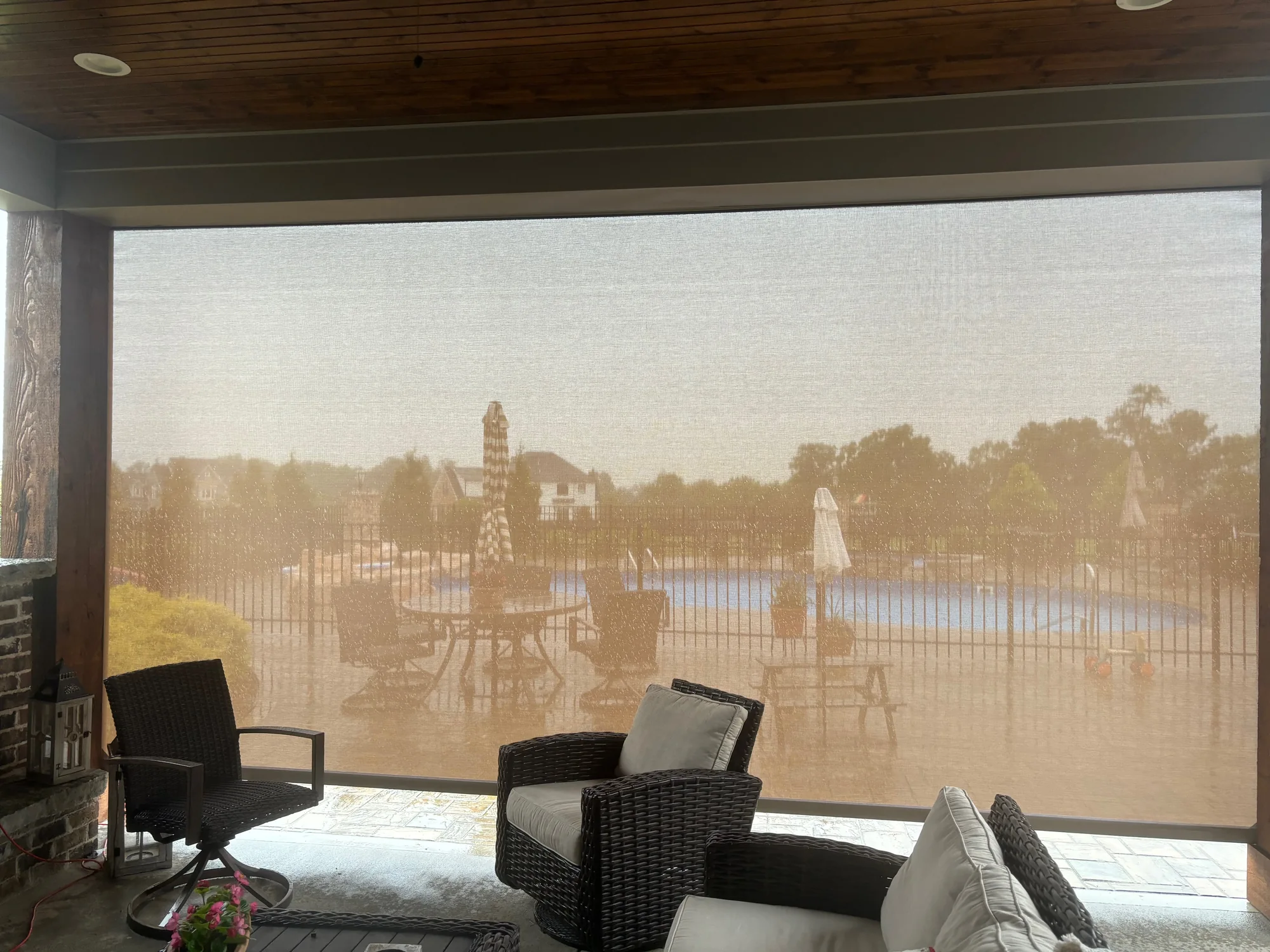Exterior Patio Shades shading a Texas room