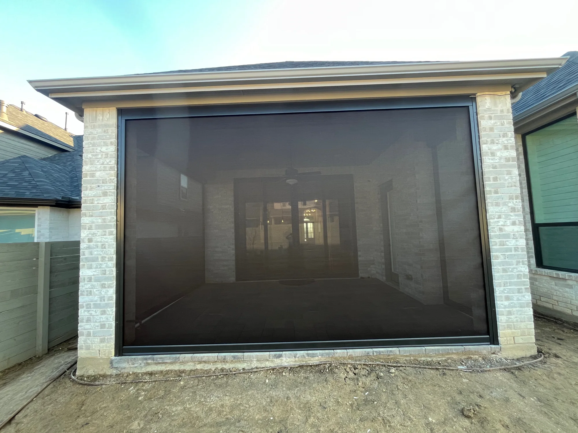 Close view of Exterior Patio Shades installed by Love Is Blinds