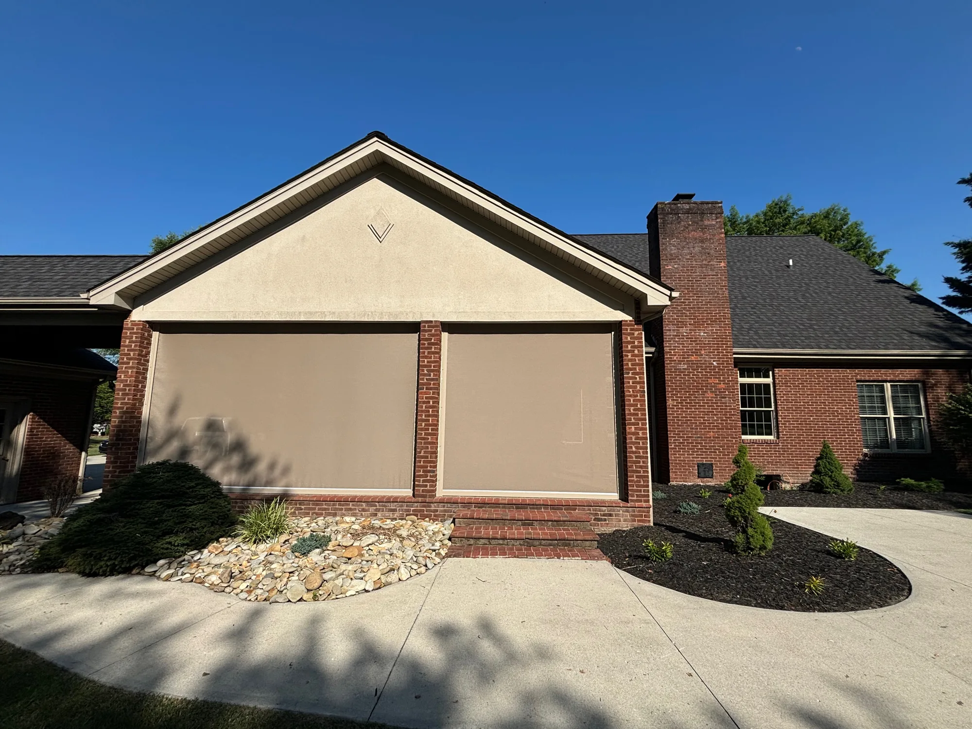 Close view of Exterior Patio Shades installed by Love Is Blinds