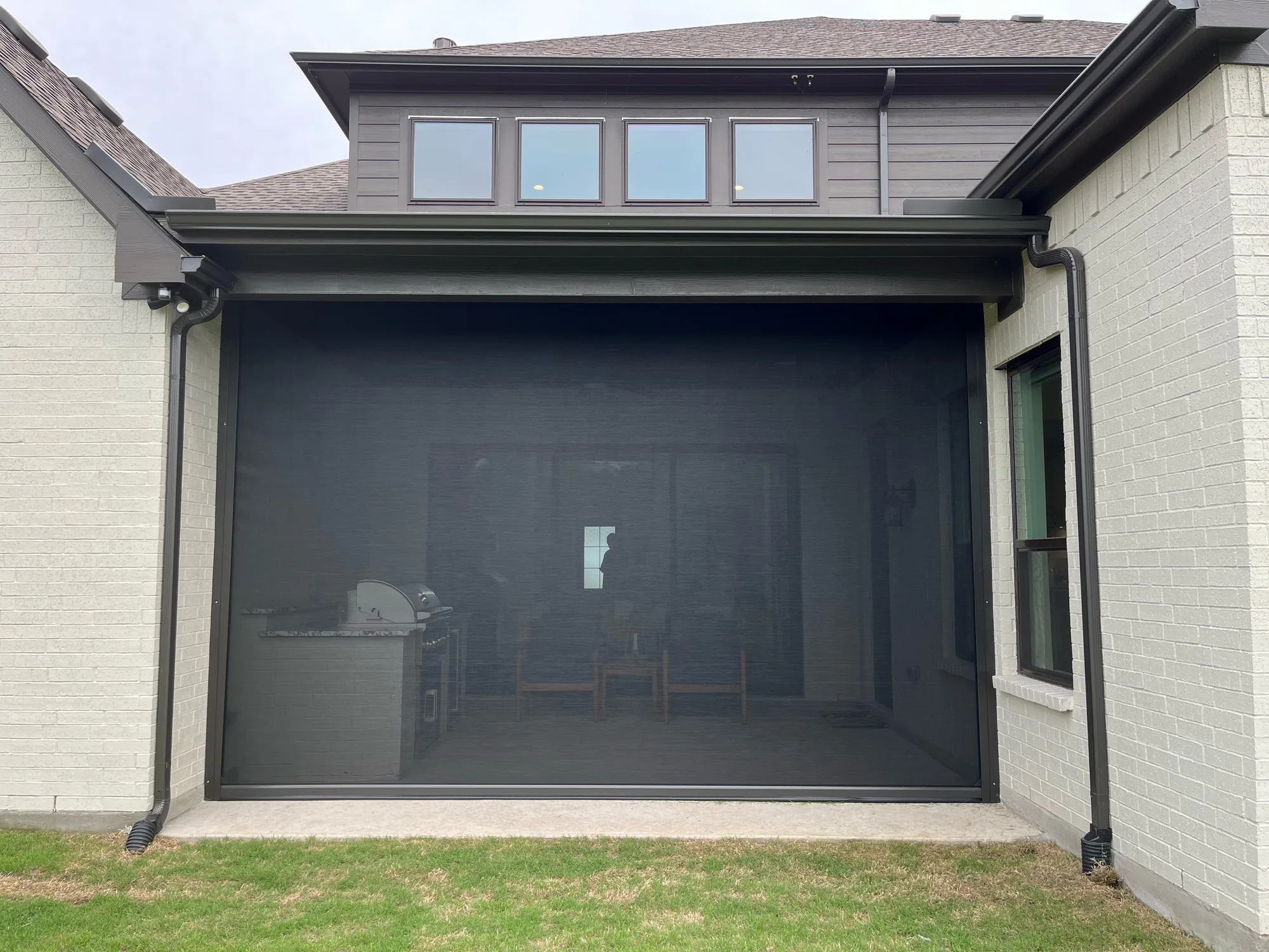 Exterior Patio Shades fitted to the window opening by Love Is Blinds