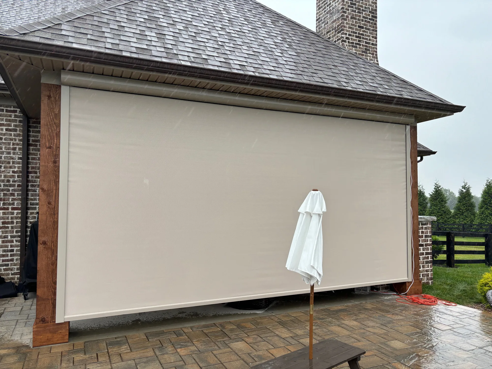 Exterior Patio Shades across a bright Texas window wall