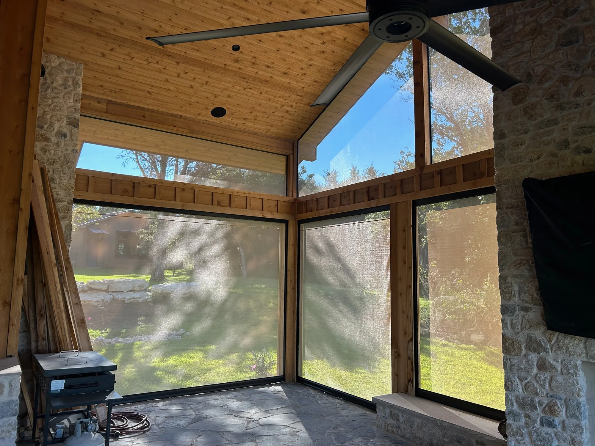 Exterior Patio Shades shading a Texas room