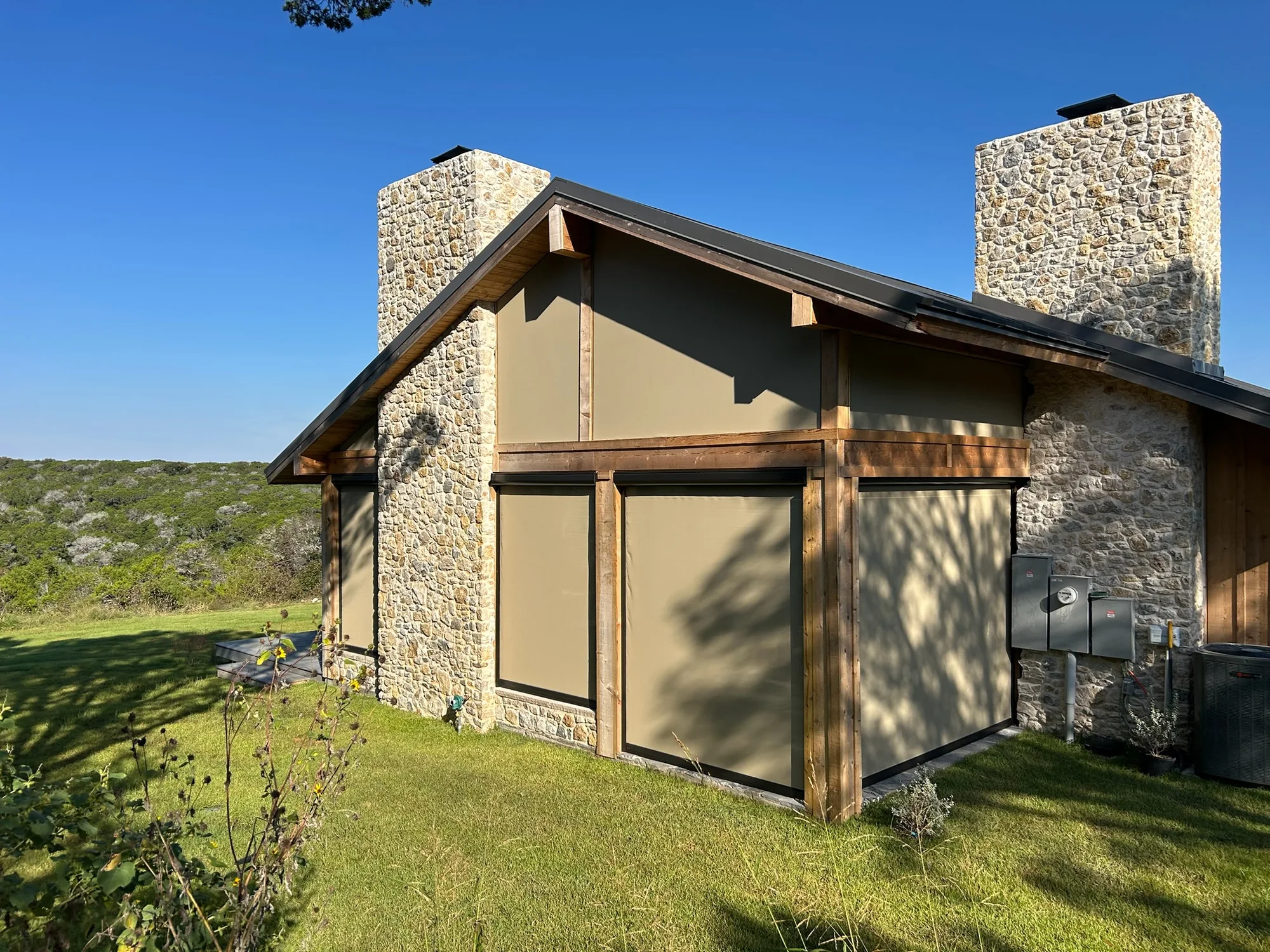 Exterior Patio Shades installed by Love Is Blinds in a Texas home