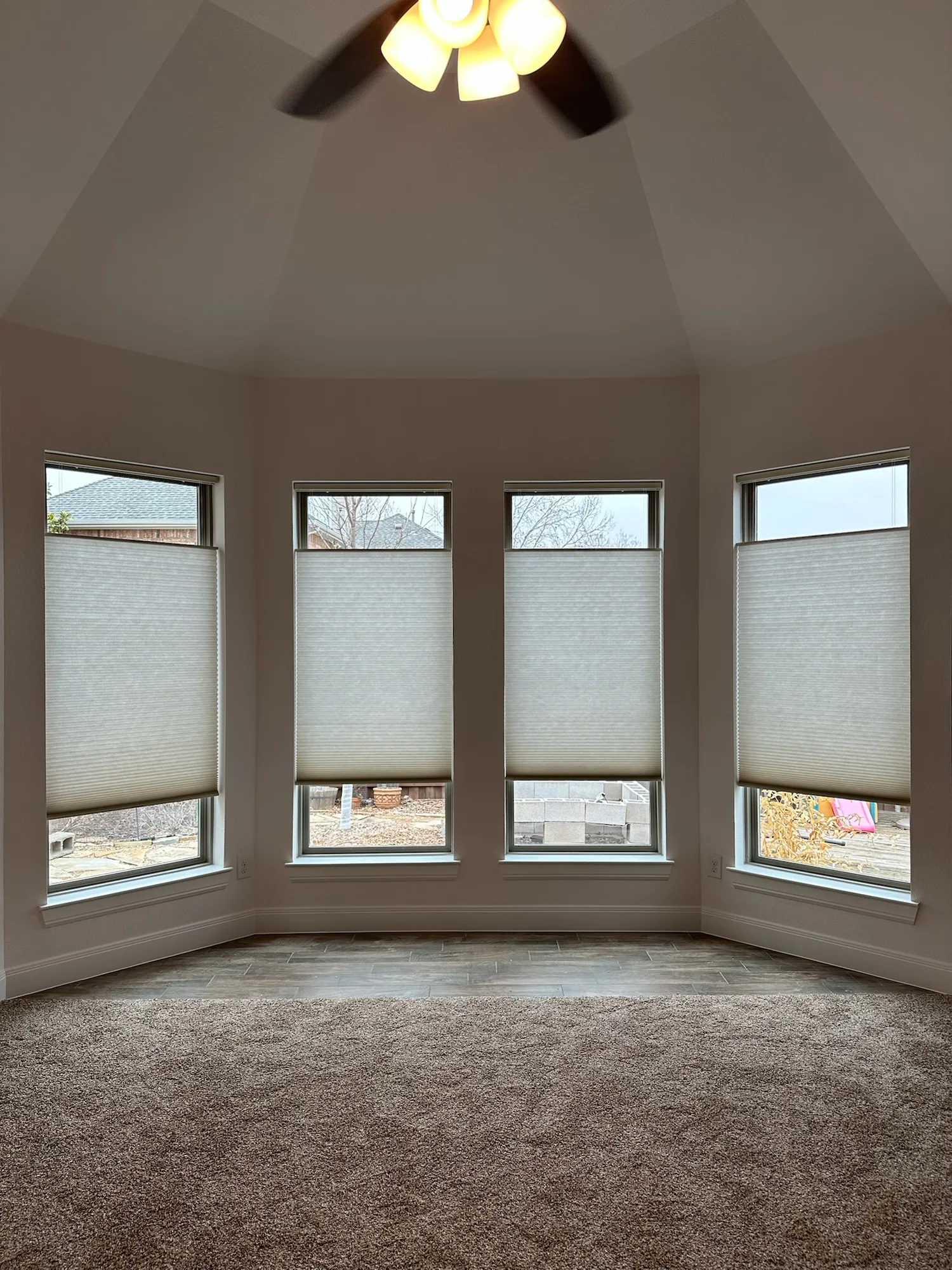 Honeycomb shades installed by Love Is Blinds in a Texas home