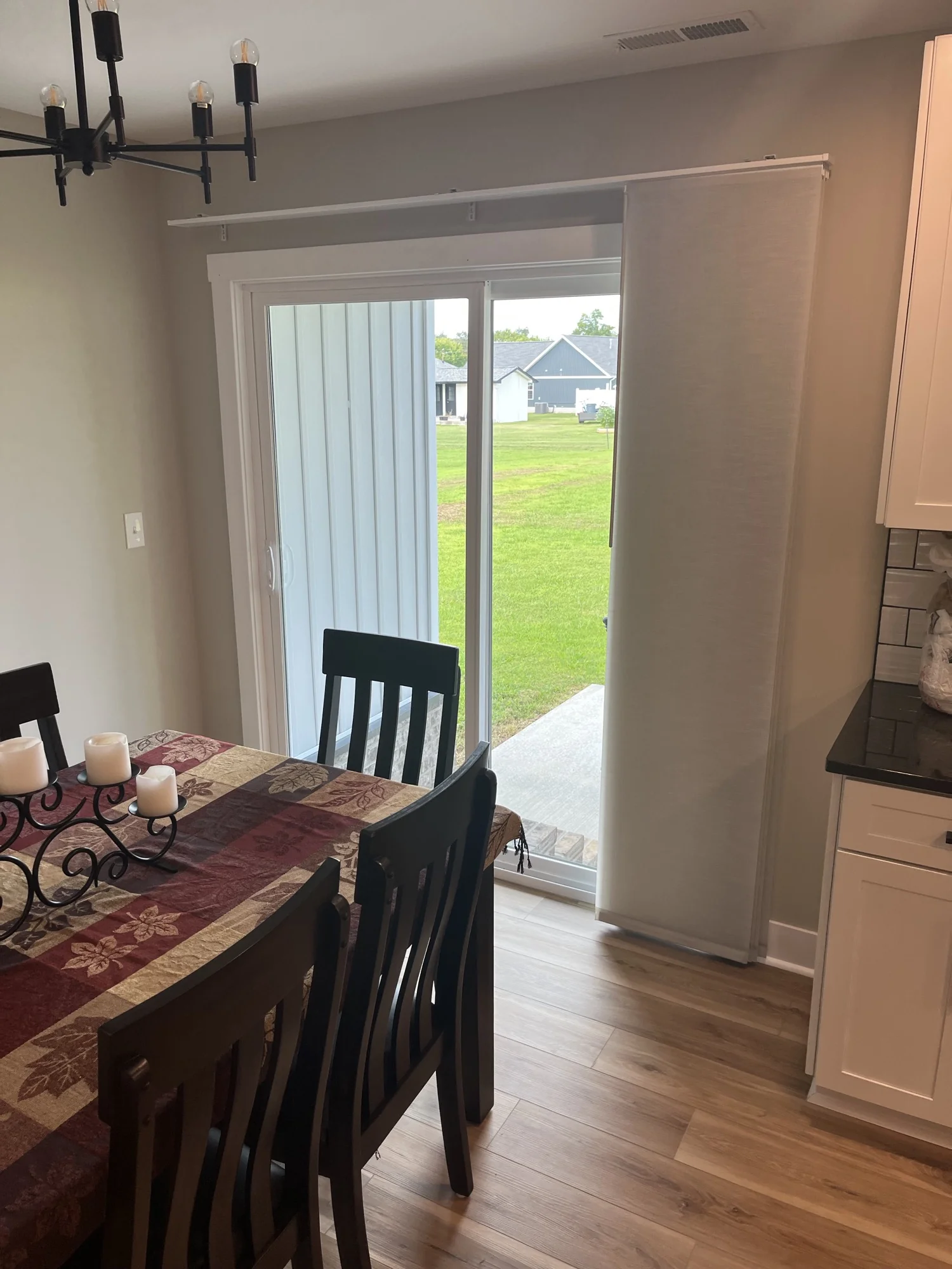 Close view of Panel Track Shades installed by Love Is Blinds