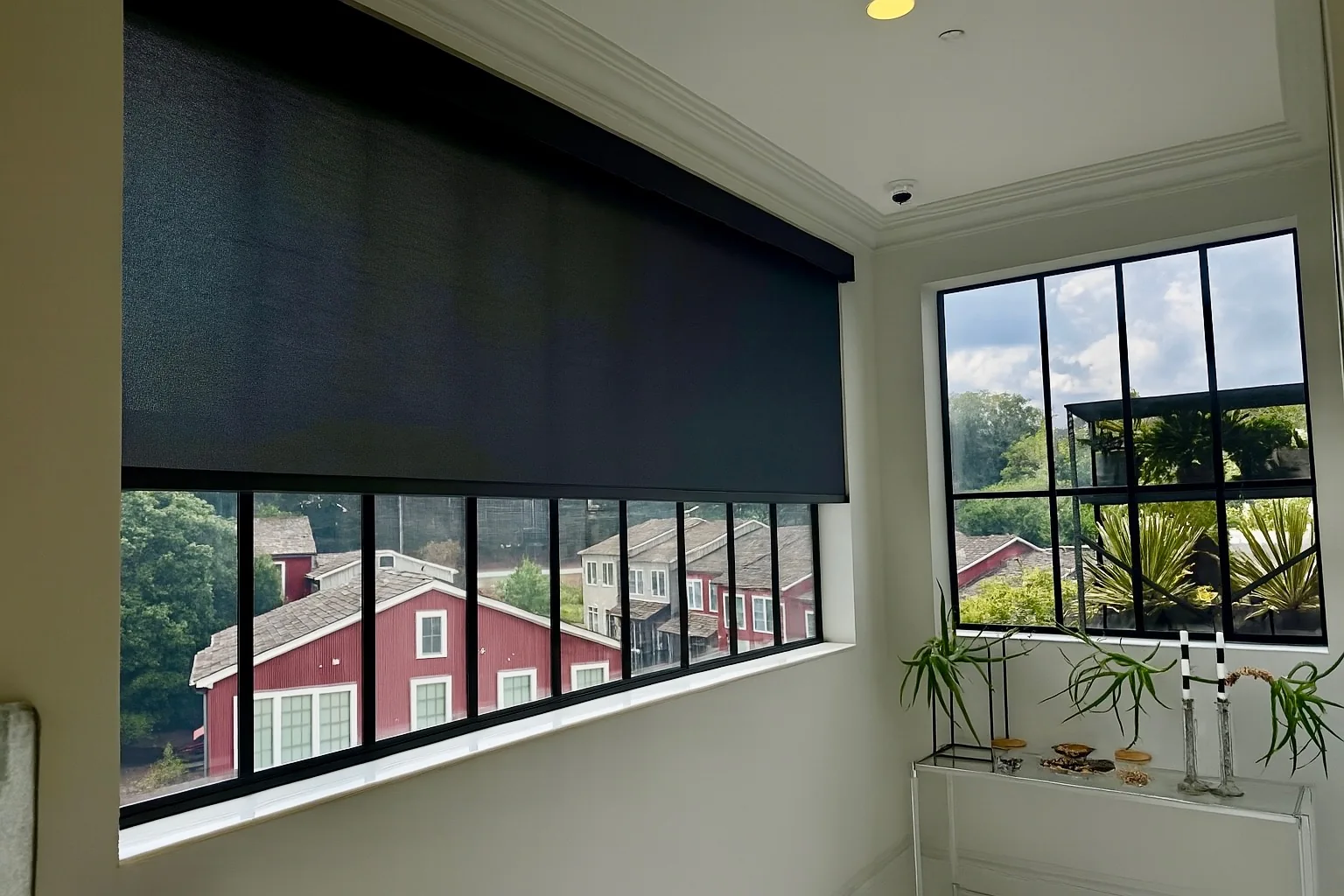 Roller Shades fitted to the window opening by Love Is Blinds