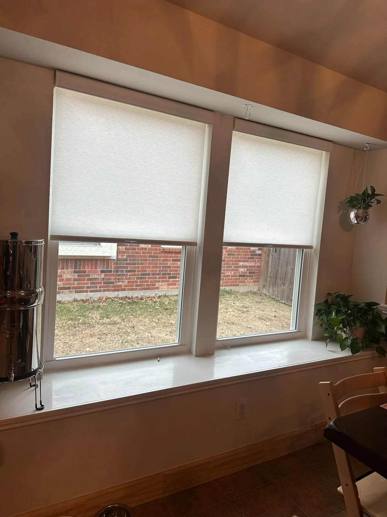 Roller Shades across a bright Texas window wall
