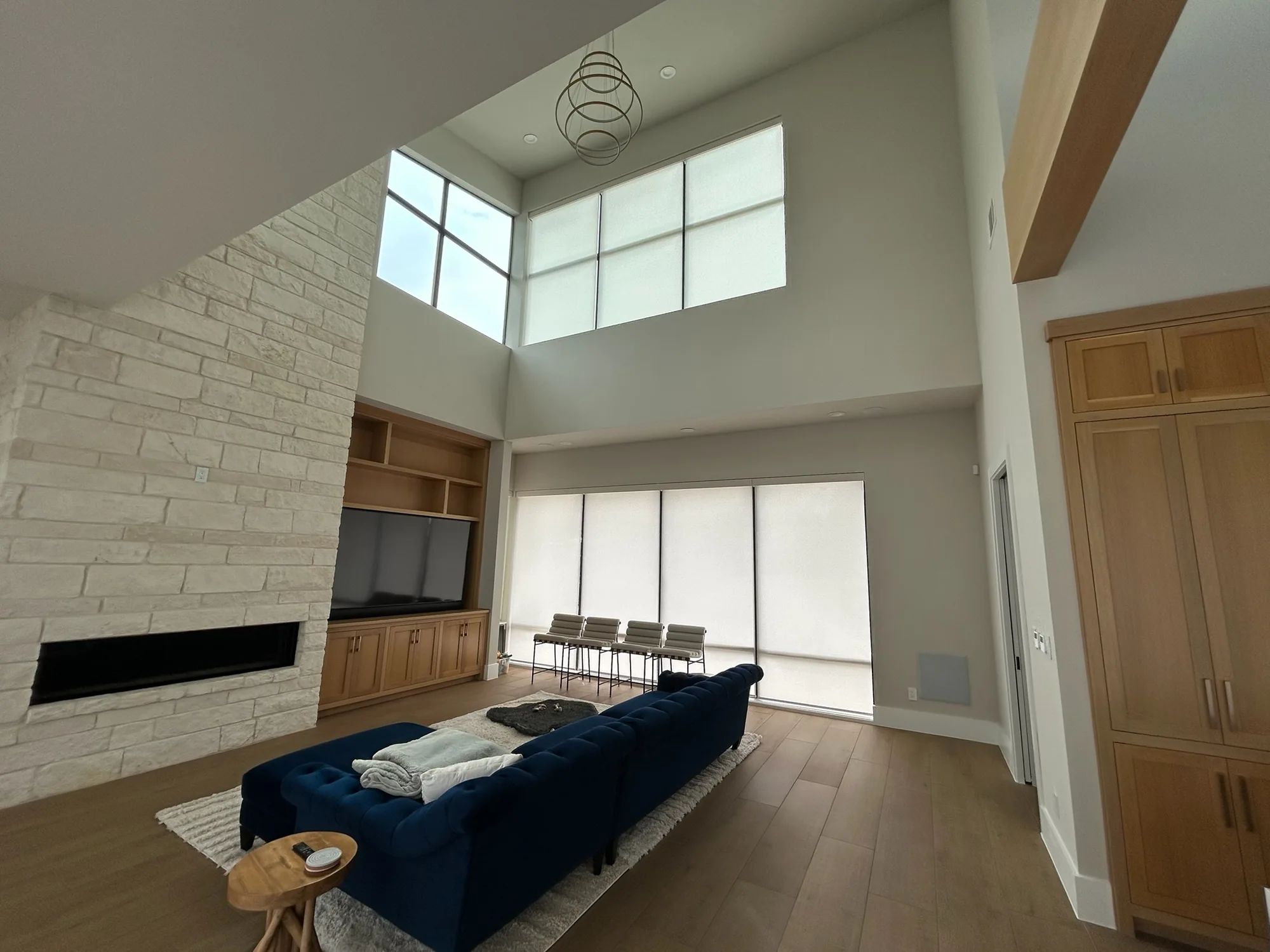 Roller Shades across a bright Texas window wall