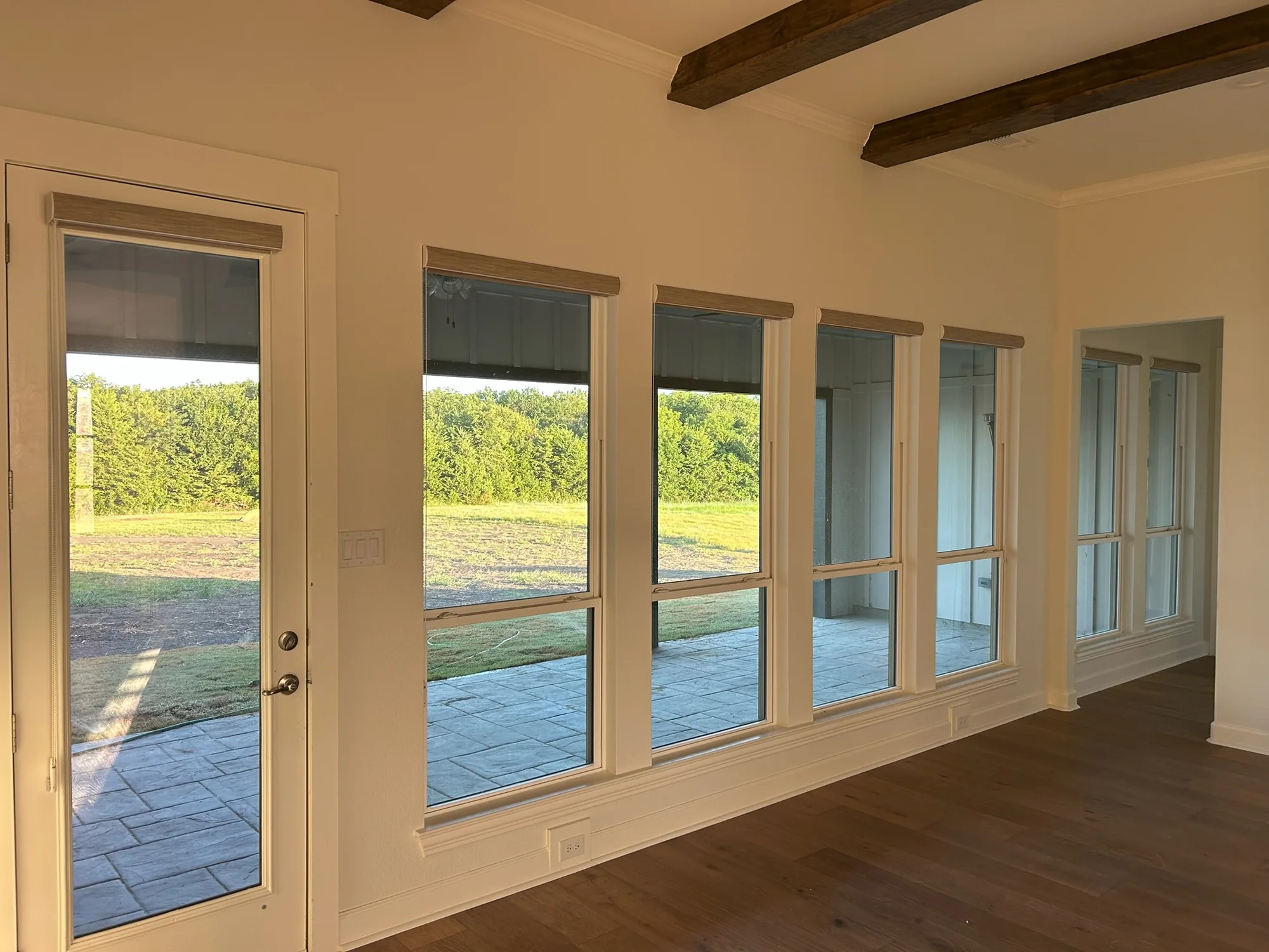 Close view of Roller Shades installed by Love Is Blinds