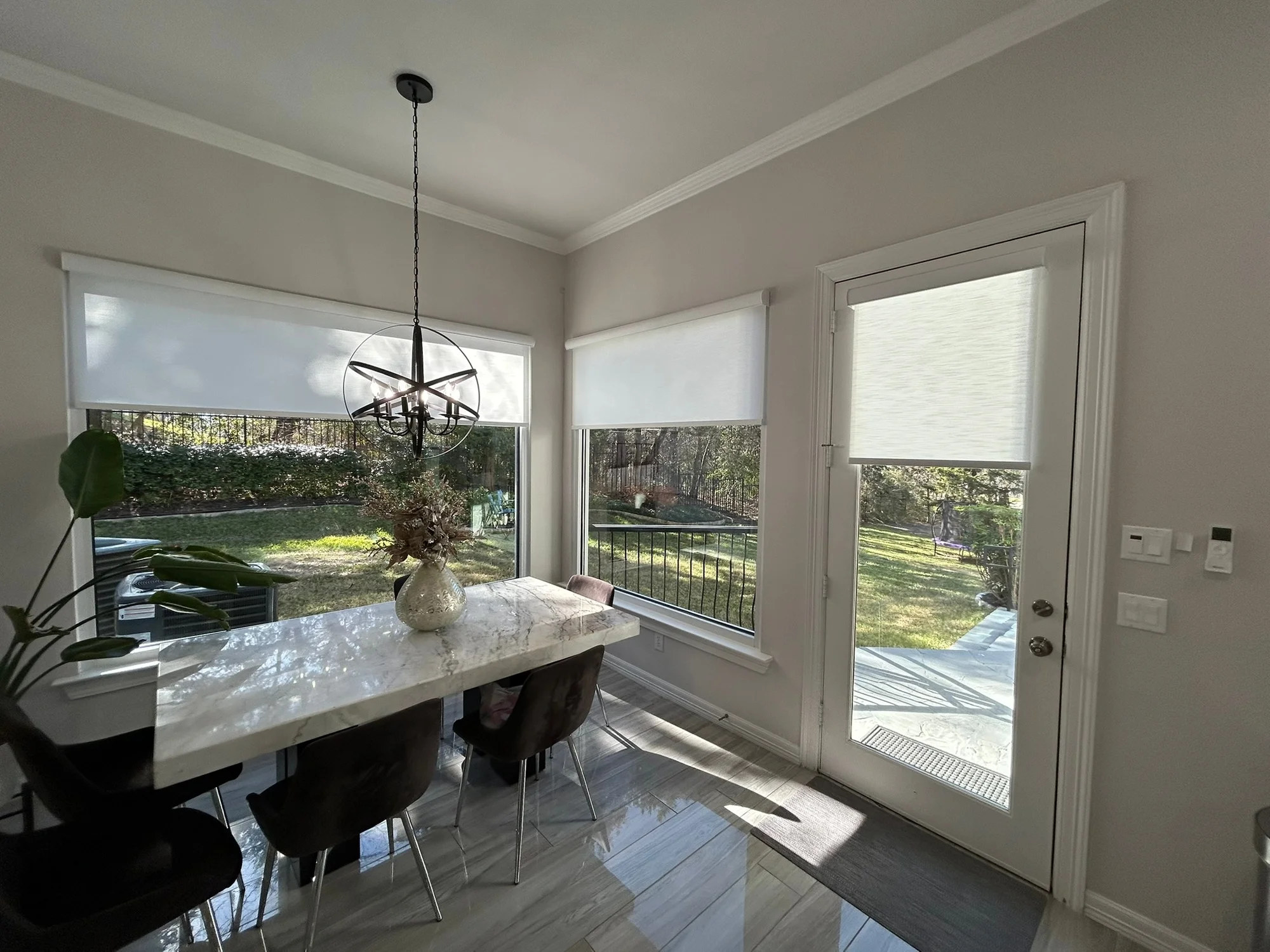 Roller shades in a Texas home, measured and installed by Love Is Blinds