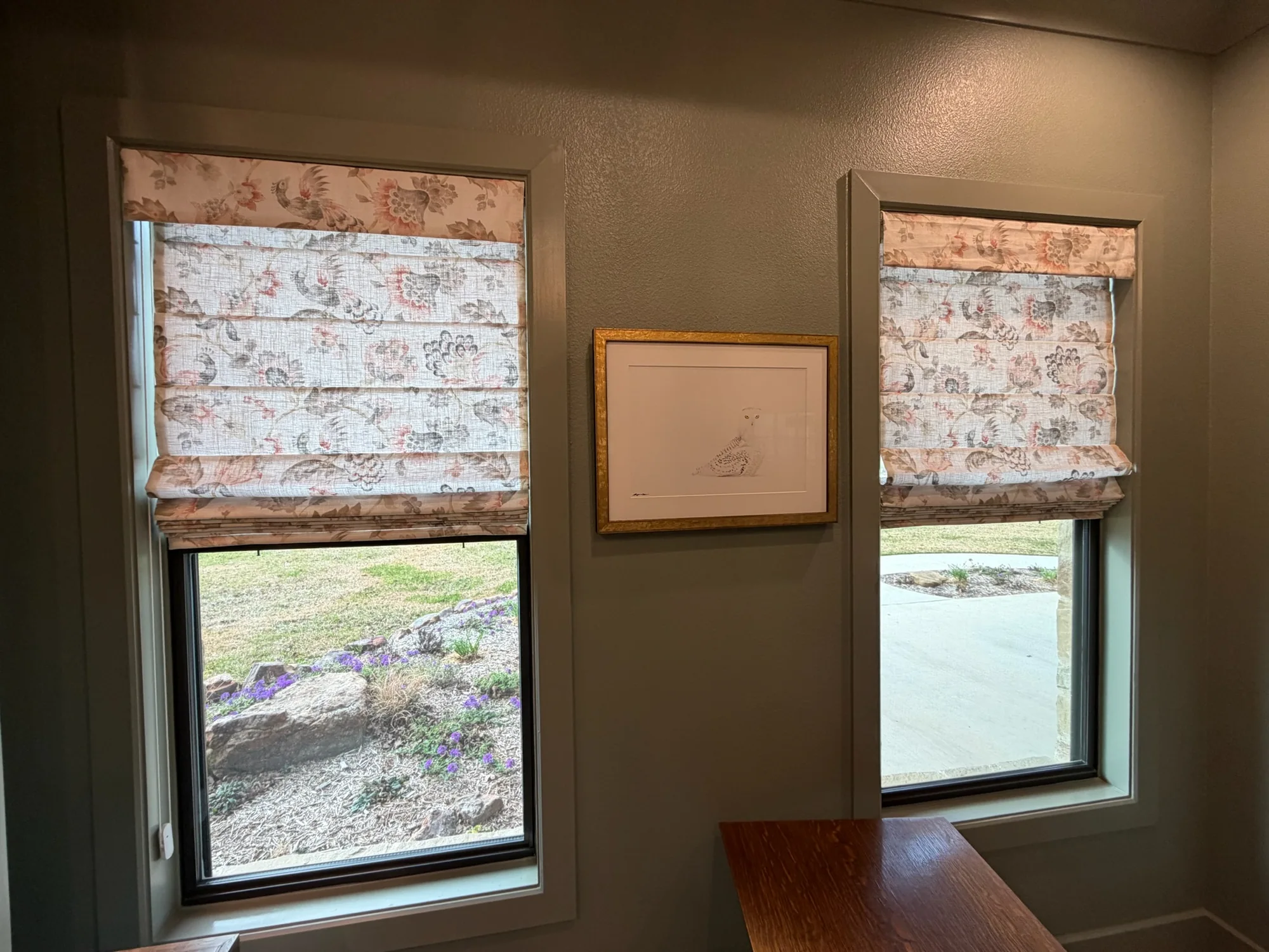 Roman & Woven across a bright Texas window wall