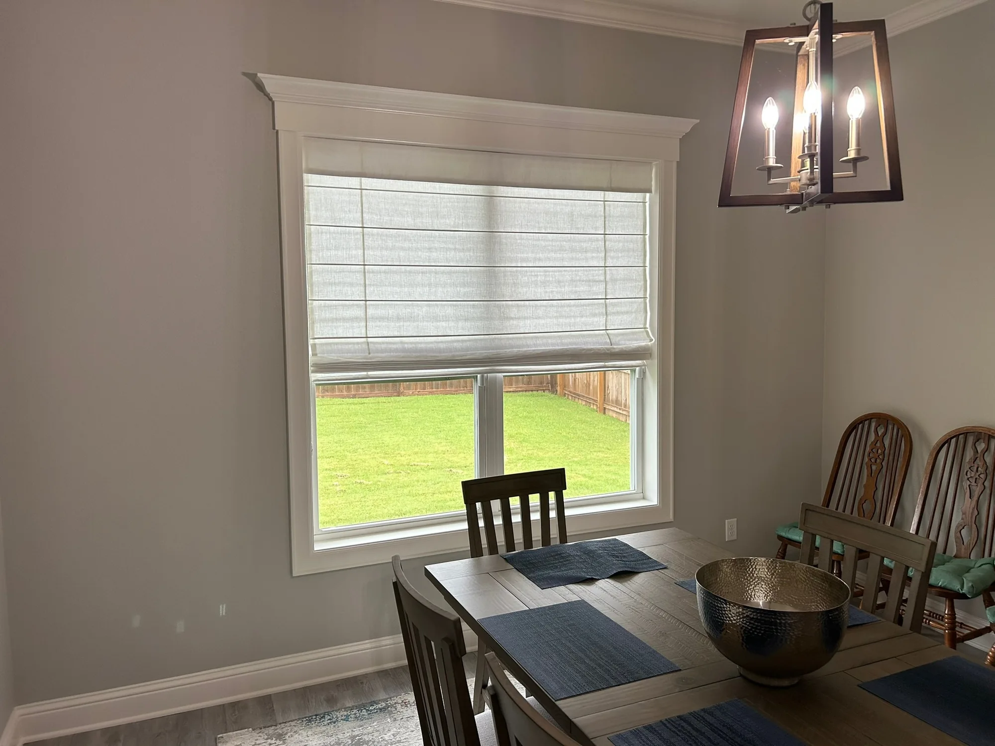 Roman & Woven shading a Texas room