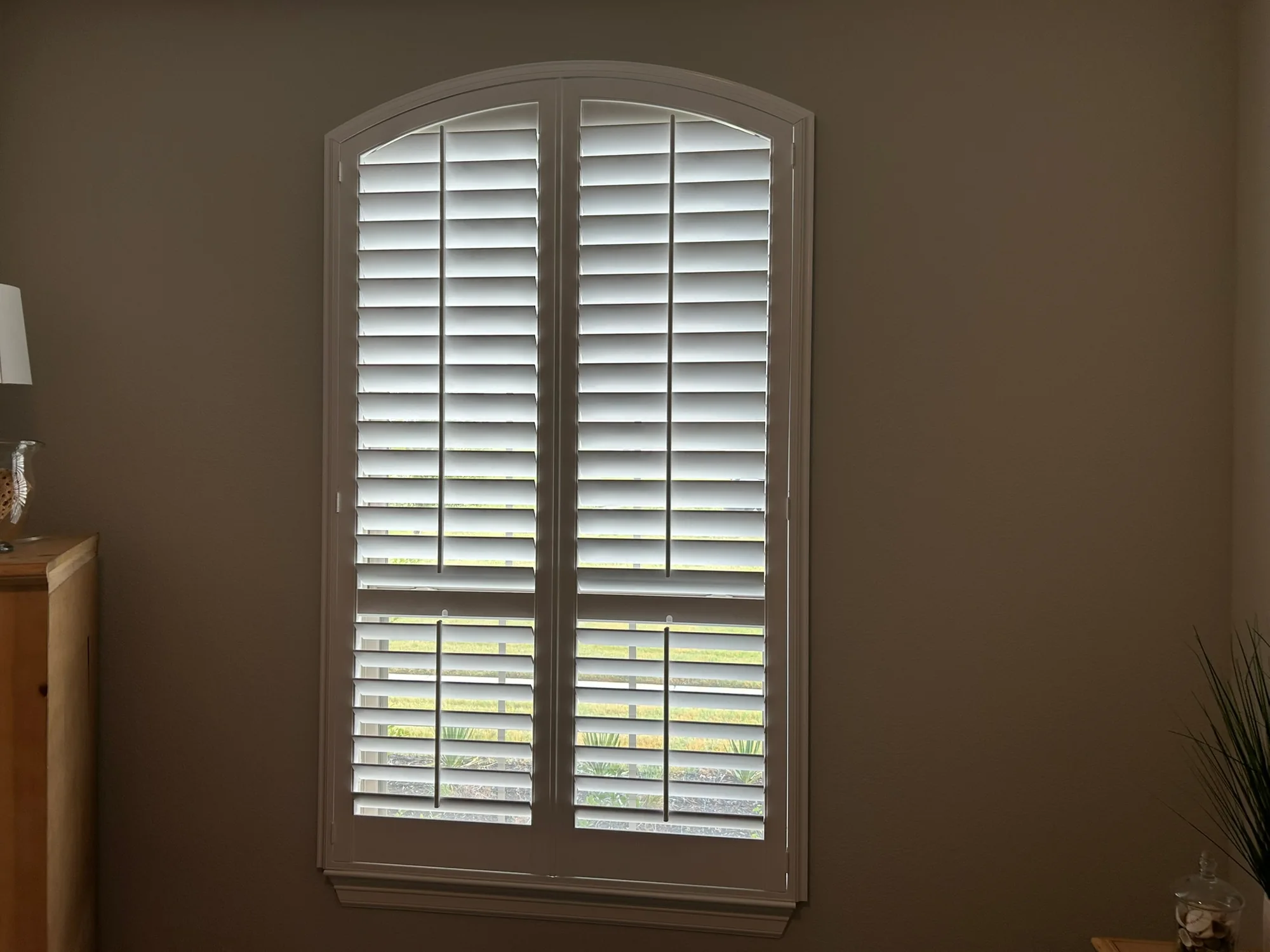 Plantation Shutters shading a Texas room