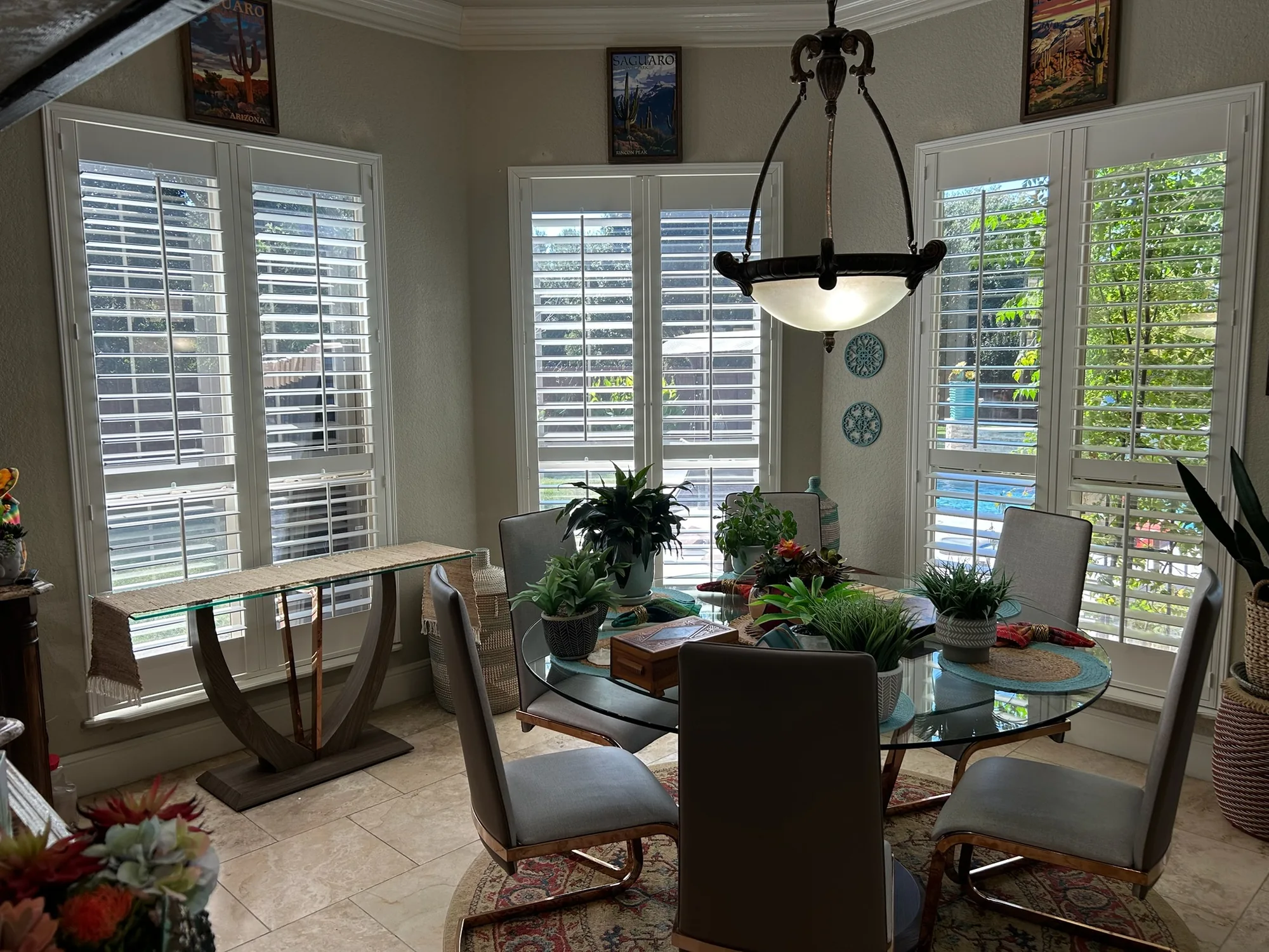 Plantation Shutters across a bright Texas window wall