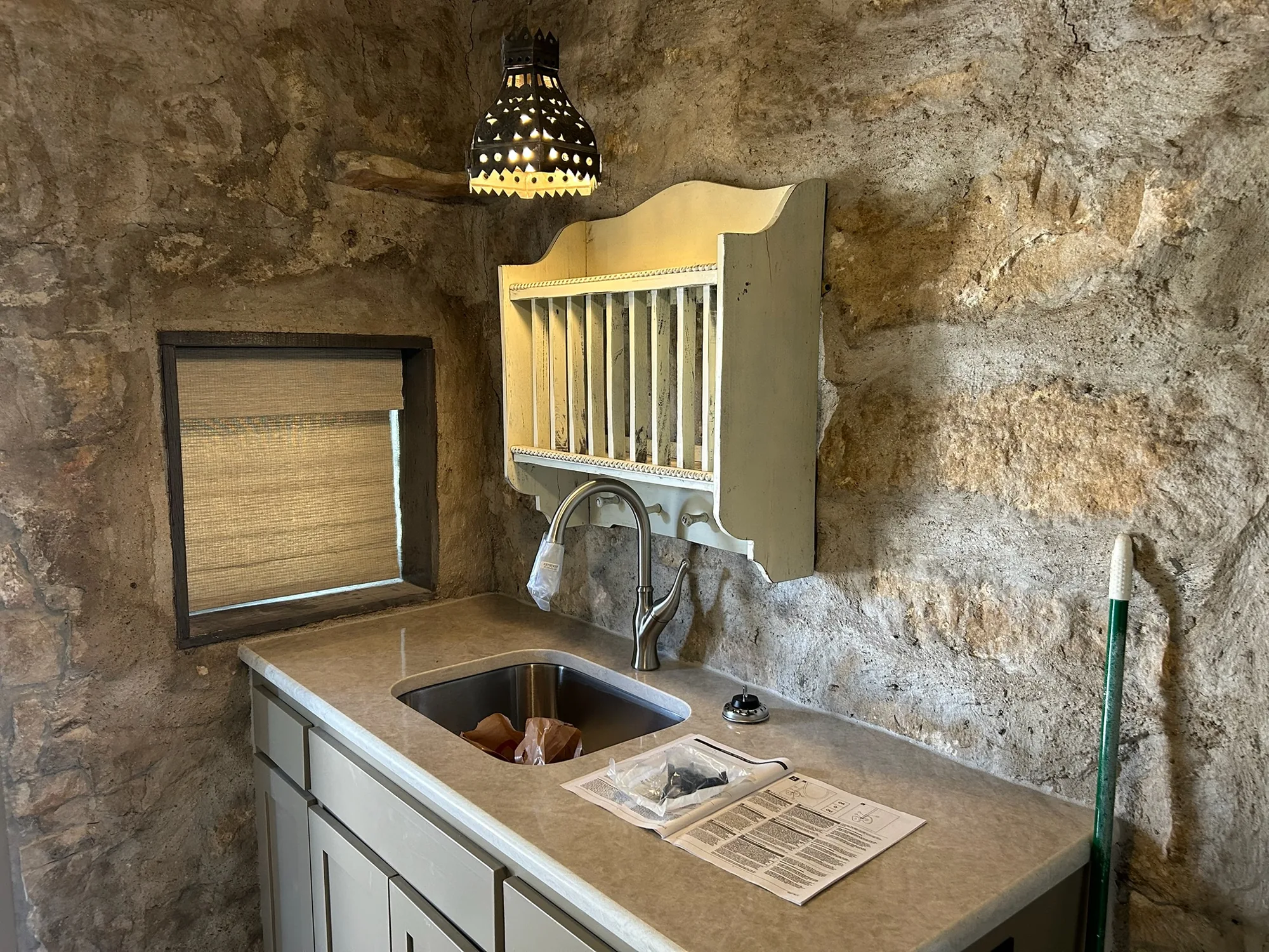 Roman & Woven across a bright Texas window wall